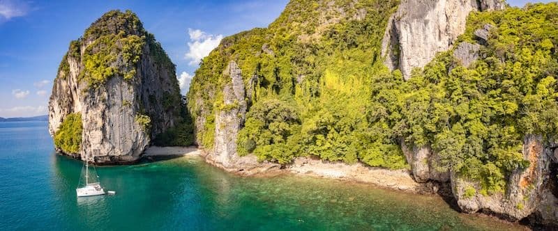 aerial view of koh kai chicken island and ko khom in krabi, thailand with catamaran