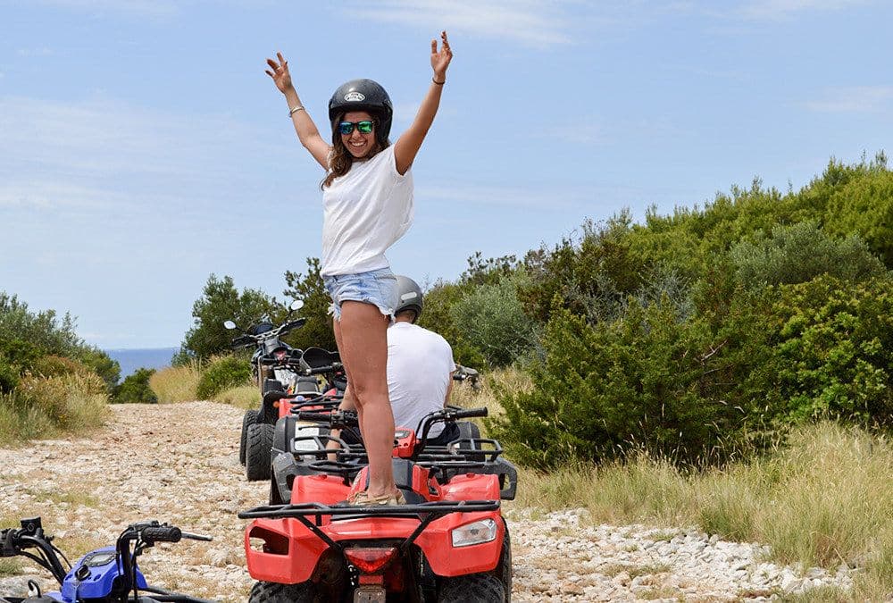 quad biking on ciovo island woman standing
