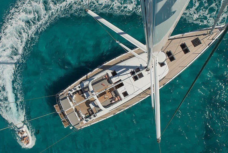 jeanneau 64 birds eye boat going around yacht