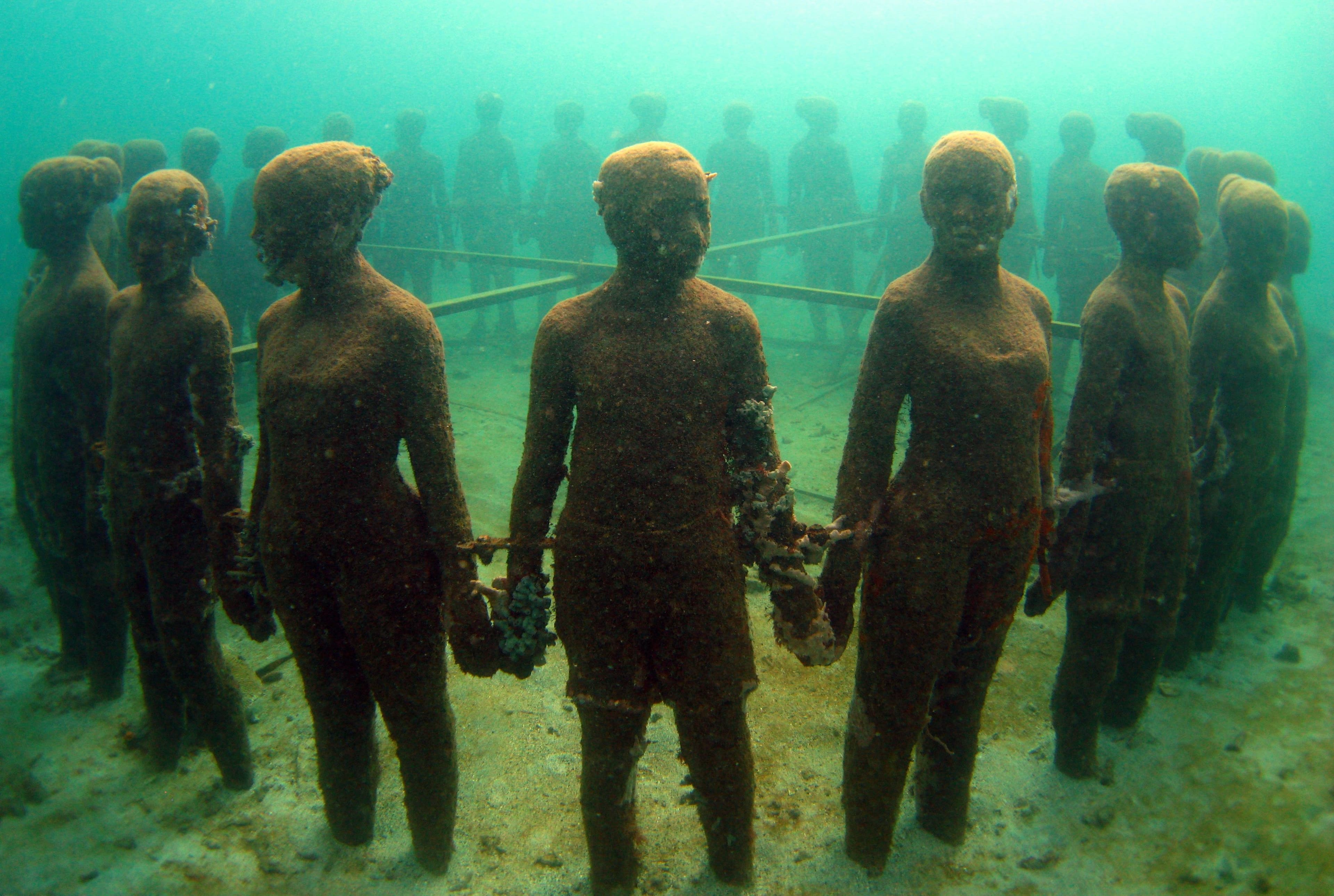 Underwater sculpture human figures ocean art