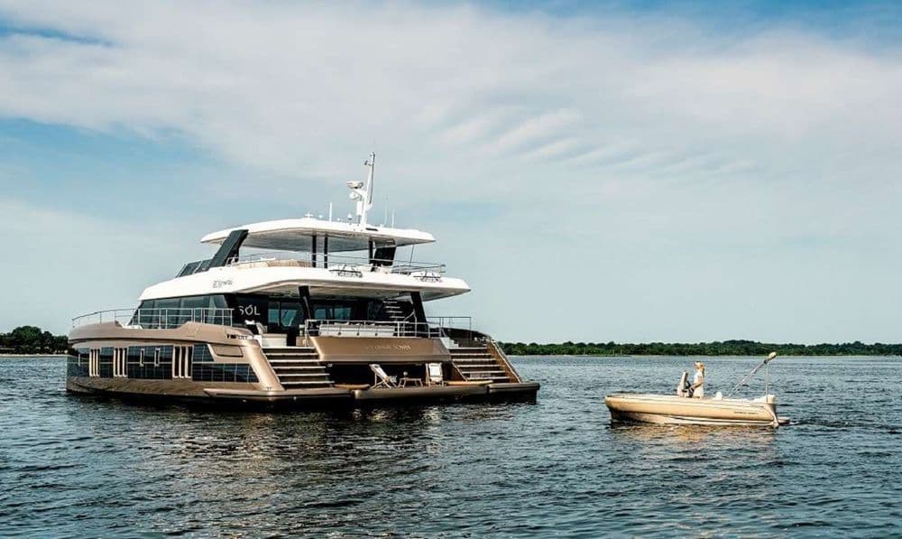 sunreef eco 80 sol exterior shot with dingy