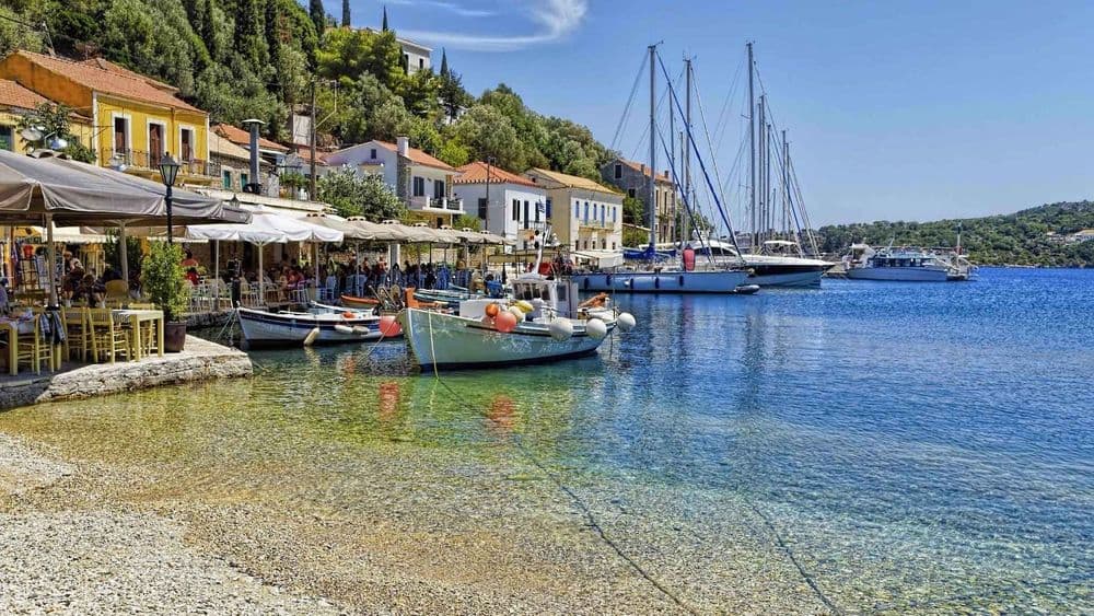 kioni greece waterfront boats moored houses